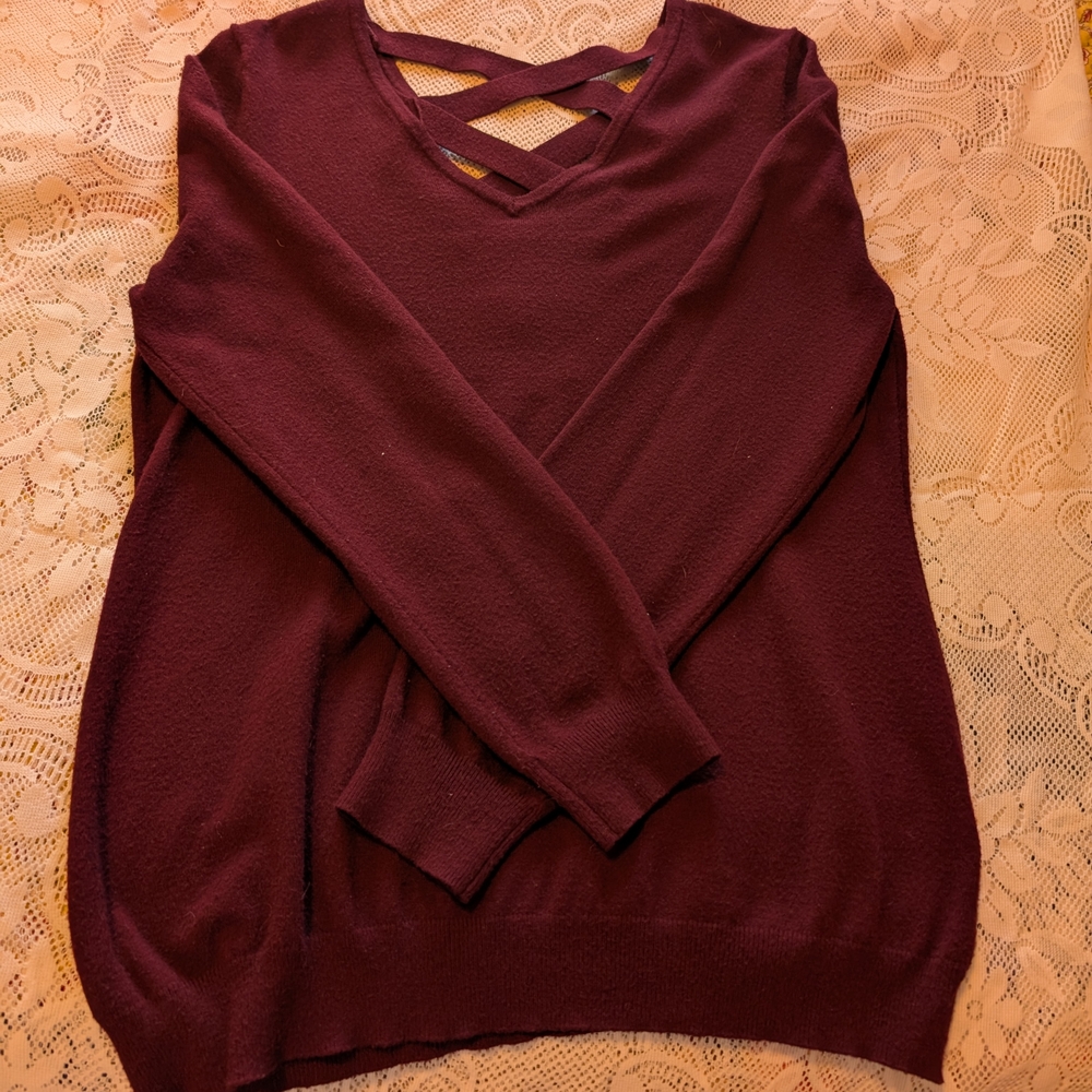 Red V-Neck Sweater with Stylish Criss-Cross Detail